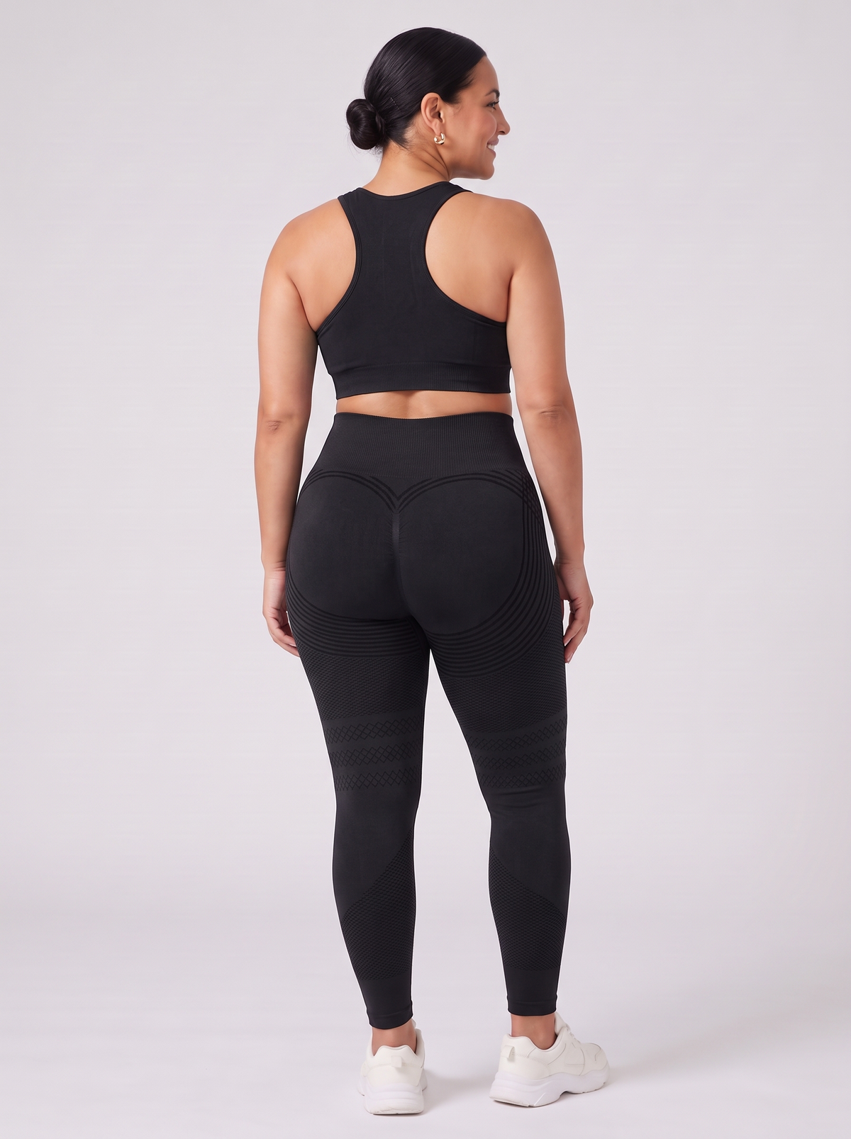 Bloom Leggings anti-cellulite leggings in Black — size XL plus-size model, back view showing sculpting contour lines