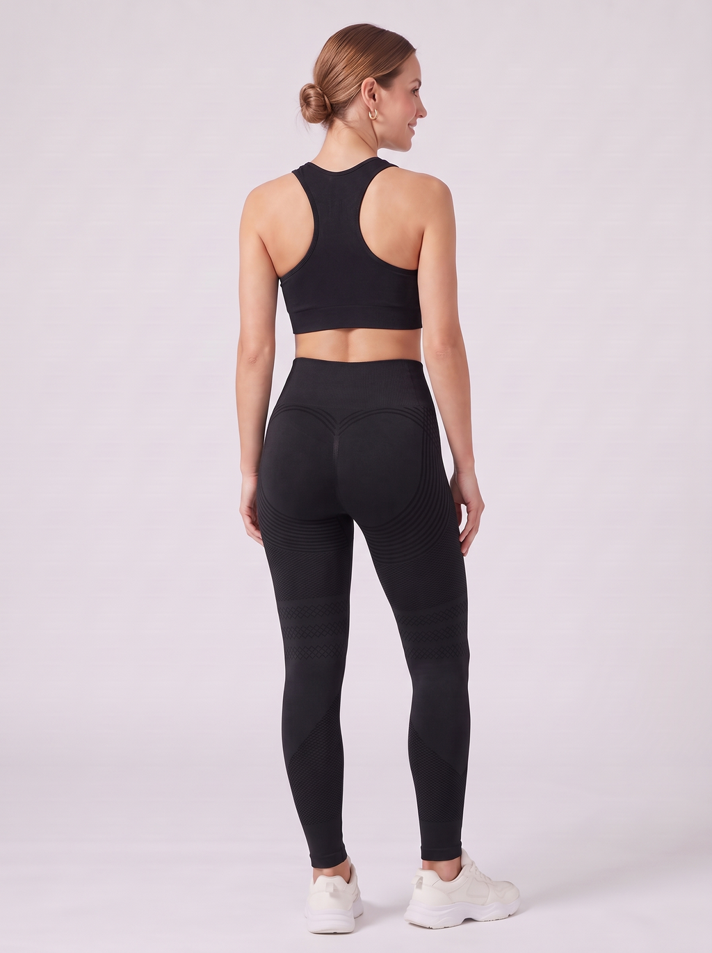 Bloom Leggings anti-cellulite leggings in Black — size S model, back view showing sculpting contour lines
