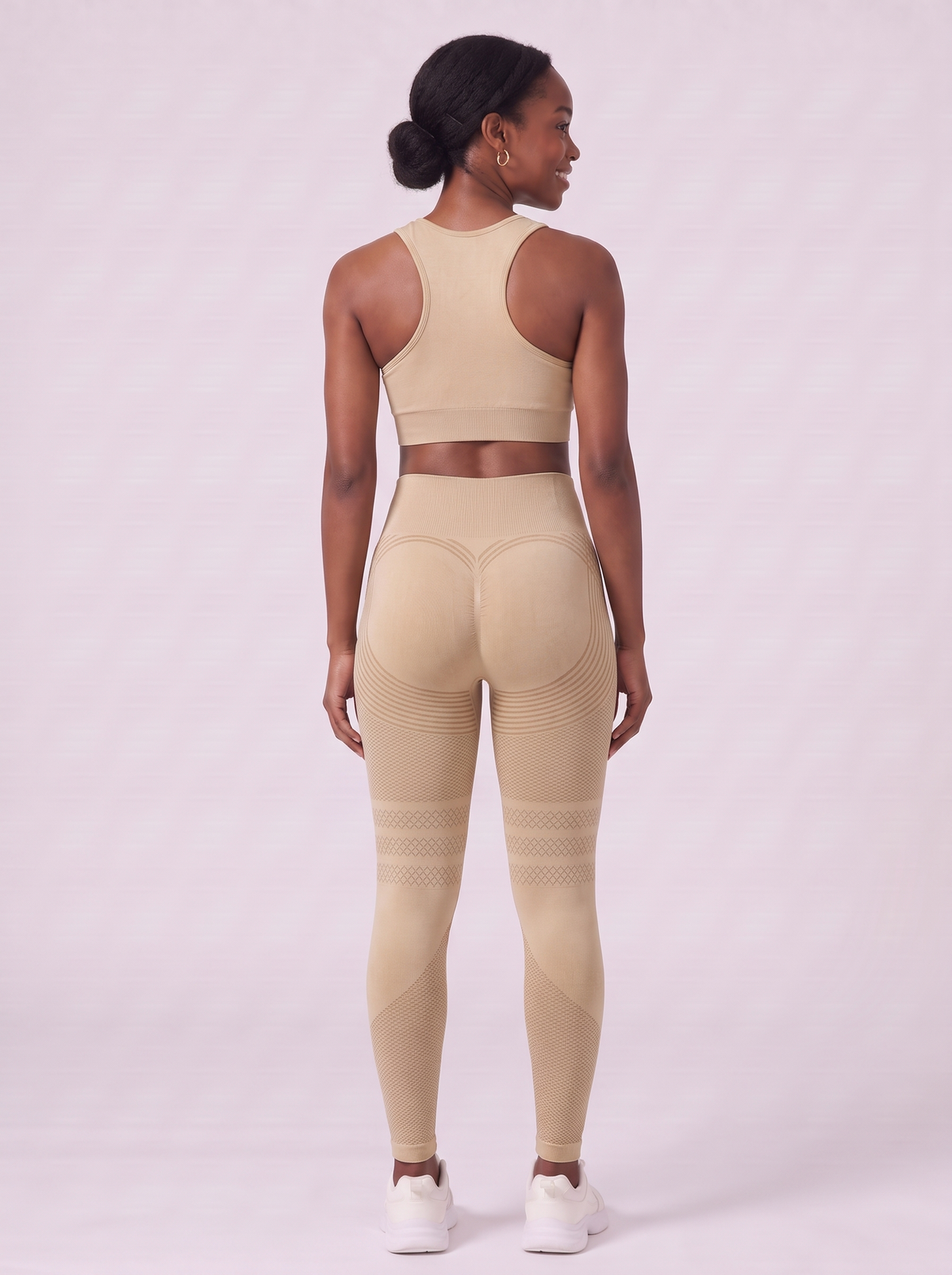 Bloom Leggings anti-cellulite leggings in Dune — size M model, back view showing sculpting contour lines