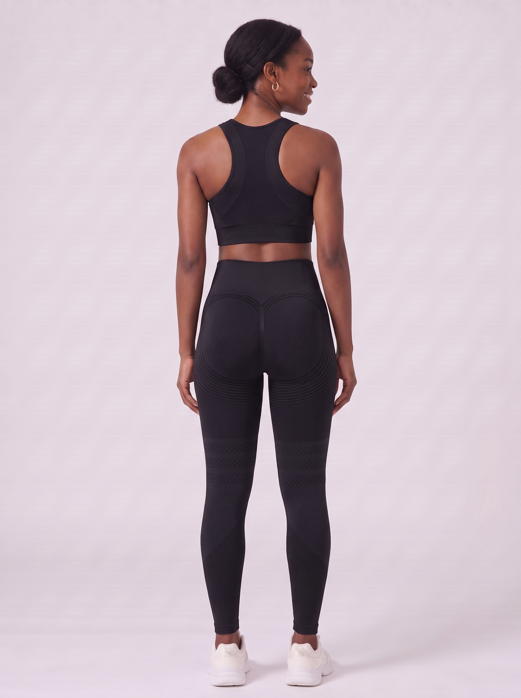 Bloom Leggings anti-cellulite leggings in Black — size M model, back view showing sculpting contour lines