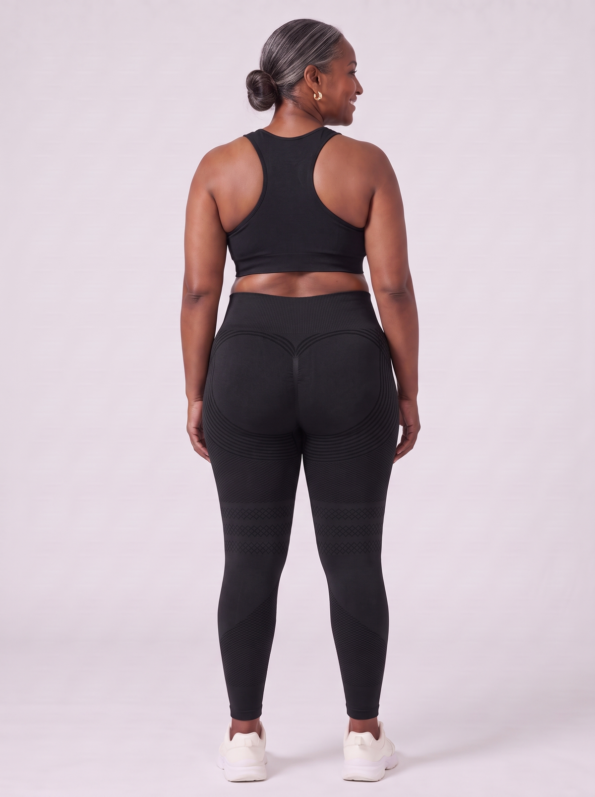 Bloom Leggings anti-cellulite leggings in Black — size 3XL plus-size model, back view showing sculpting contour lines